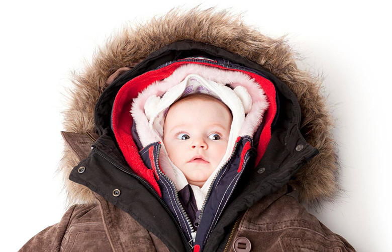 При какой температуре одевать ребенку зимний комбинезон на овчине